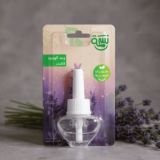 Lavender-scented fragrance refill bottle with fresh lavender flowers on a calm, muted purple-gray background

